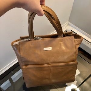 Cole Haan tan color purse